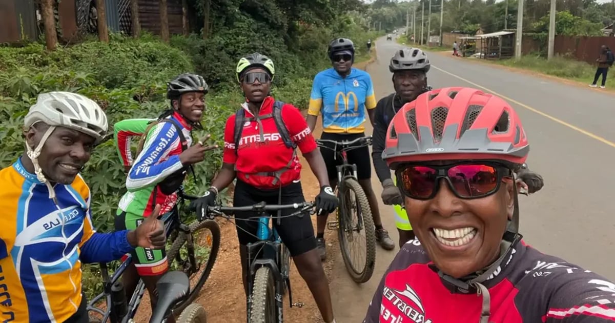 Joy Riders Kenya cyclists pausing for a selfie mid-ride on 27 May 2026