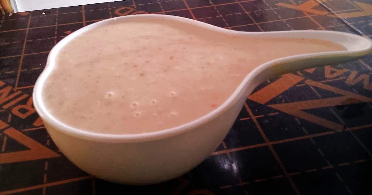 A calabash bowl of uji power served at a Kenyan restaurant