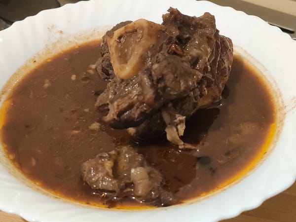 Close-up of bone-in boiled beef with marrow in mchuzi wa nyama stew