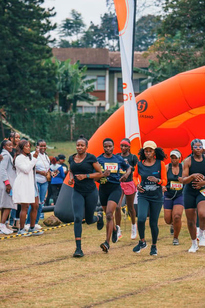 Women participants running at a Hy.brid fitness racing event at KSTVET in Gigiri, Nairobi