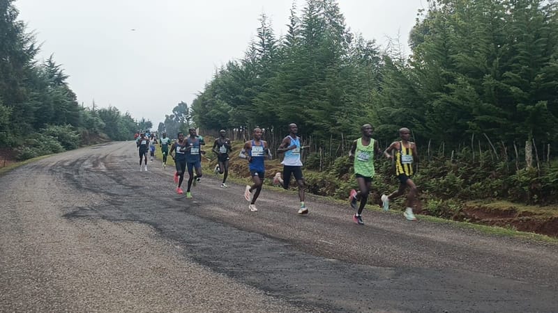 Runners on the road during the 2026 Kaptagat Forest Marathon