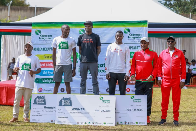 Lawrence Larot, centre, on the podium after winning the elite men