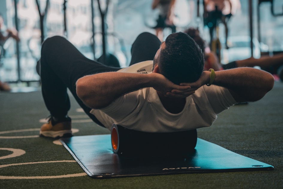 Athlete doing dynamic warm-up exercises before lifting